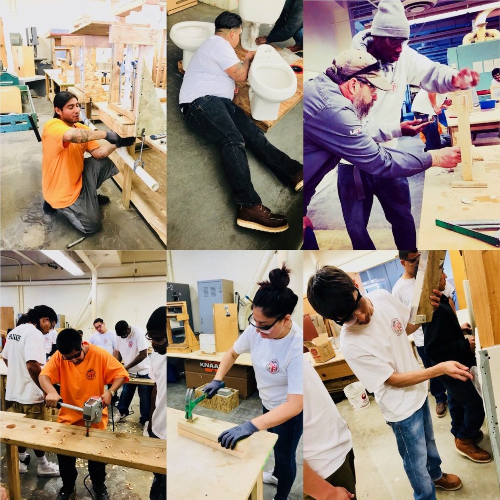 People learning carpentry and plumbing in workshop
