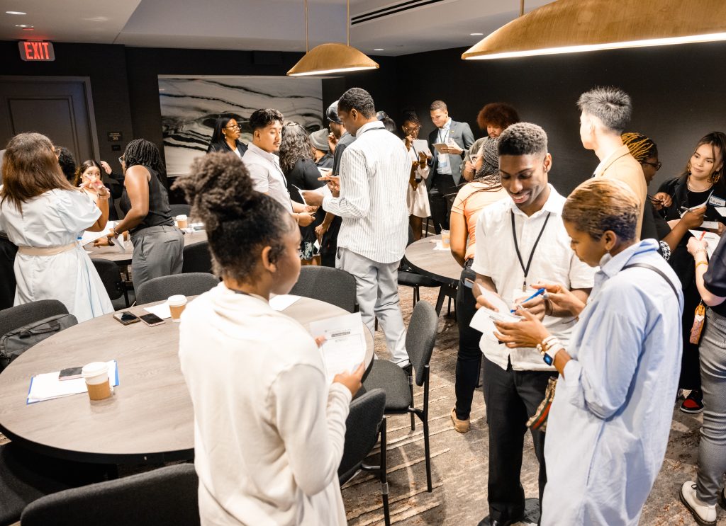 Group of people networking at conference