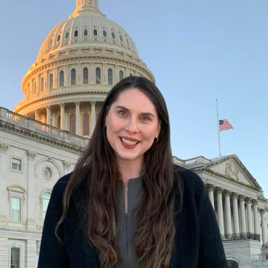 Smiling woman in front of the US Capitol