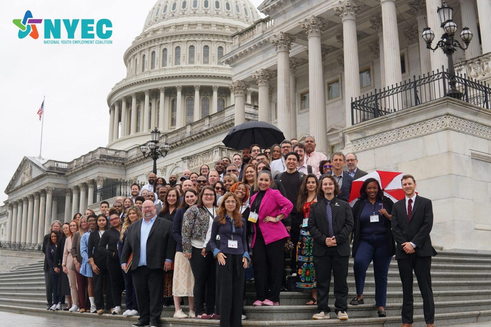 DC Summit attendees gather for a group photo on the steps of the U.S. Capitol